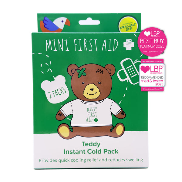 Packaging for Mini First Aid Teddy Instant Cold Pack featuring an illustration of a teddy bear wearing a t-shirt with the text 'Mini First Aid'. The package indicates that there are 2 packs inside and highlights the product's function for providing quick cooling relief.